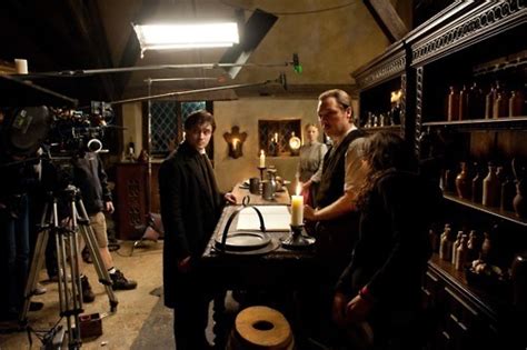 the woman in black behind the scenes